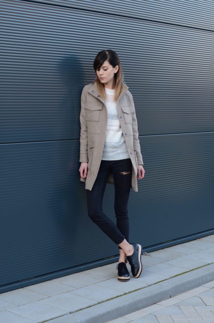 Military Fashion Trend: Lovely by Lucy is wearing a beige Asos jacket with a pair of ripped skinny jeans