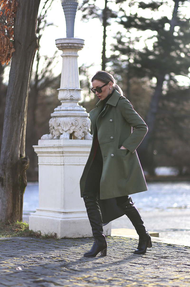Steal Ioana Chisiu’s hot military style by wearing a classic khaki army jacket with leather over the knee boots and a pair of Ray Bans! This look is seasonal, stylish, and individual; we love it! Coat: Sheinside, Jeans: Glittio, Boots: Michael Kors.