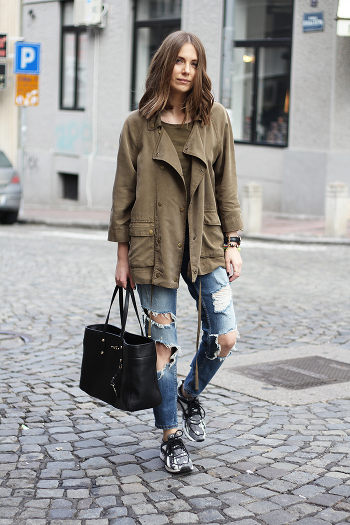 Vanja Milicevic is wearing an army green T-shirt and jacket both from Zara
