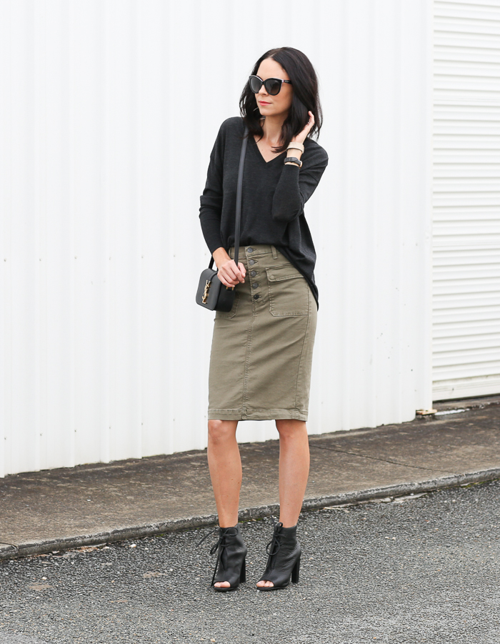 Fiona Edwards is in an edgy army green denim skirt and black lace up heels to complete a militarily inspired outfit Skirt: J Brand, Shoes: Manning Cartel